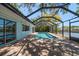 Private pool and lanai with waterfront views and easy access to the canal at 4036 Church Creek Pt, Largo, FL 33774