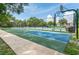 Community basketball court with well-maintained surface and surrounding greenery at 4201 La Palma Ct, Tampa, FL 33611