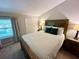 Bedroom featuring natural light, carpet, and neutral tones at 4201 La Palma Ct, Tampa, FL 33611