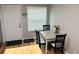 Cozy dining area near the entrance, illuminated by natural light at 4201 La Palma Ct, Tampa, FL 33611