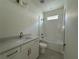 Elegant bathroom featuring white vanity, quartz countertop, and tiled shower over tub at 5011 21St N Ave, St Petersburg, FL 33710