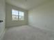 Bright bedroom features a large window offering natural light and a view of the outdoors at 5011 21St N Ave, St Petersburg, FL 33710
