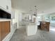 Beautiful kitchen boasts white cabinets, granite countertops, and stainless steel appliances at 5011 21St N Ave, St Petersburg, FL 33710