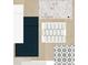 Showcasing the materials with white and navy kitchen cabinet door styles, countertops, flooring, and tiles at 5011 21St N Ave, St Petersburg, FL 33710