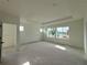 Spacious room features large windows and recessed lighting, creating an airy ambiance at 5011 21St N Ave, St Petersburg, FL 33710
