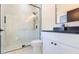 Modern bathroom with a glass shower, black fixtures, and marble flooring at 526 39Th S Ave, St Petersburg, FL 33705