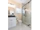 Chic bathroom featuring a glass shower, dark fixtures, and modern marble floors at 526 39Th S Ave, St Petersburg, FL 33705