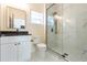 Elegant bathroom with glass-enclosed shower, marble accents, and modern fixtures at 526 39Th S Ave, St Petersburg, FL 33705