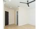 Bedroom showing light wood floors, fresh paint, and modern doors leading to large closet at 526 39Th S Ave, St Petersburg, FL 33705