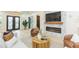 Spacious living room featuring a stone fireplace, modern furnishings, and ample natural light at 526 39Th S Ave, St Petersburg, FL 33705
