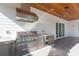 This outdoor kitchen is equipped with stainless steel appliances, perfect for grilling and entertaining at 526 39Th S Ave, St Petersburg, FL 33705
