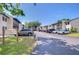 Exterior view of the Palma Ceia Place Condominiums, highlighting the well-maintained buildings and ample parking at 527 S Lincoln Ave # A108, Tampa, FL 33609