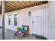 Close-up of condo entrance featuring a charming seating area at 527 S Lincoln Ave # A108, Tampa, FL 33609