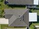 Aerial view of home showcasing roof, surrounding landscape, and patio at 5425 Rainwood Meadows Dr, Apollo Beach, FL 33572