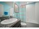 Bright bathroom with a vanity, granite countertops, and a shower-tub combo at 5425 Rainwood Meadows Dr, Apollo Beach, FL 33572