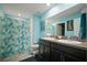 Spacious bathroom with dual sinks, granite countertops, and a shower-tub combo at 5425 Rainwood Meadows Dr, Apollo Beach, FL 33572