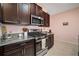 Well-equipped kitchen features granite counters and stainless steel appliances at 5425 Rainwood Meadows Dr, Apollo Beach, FL 33572