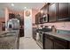 Spacious kitchen features stainless steel appliances, granite counters, and ample cabinet space at 5425 Rainwood Meadows Dr, Apollo Beach, FL 33572