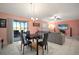 Open-concept living space featuring a sliding glass door for seamless indoor/outdoor living at 5425 Rainwood Meadows Dr, Apollo Beach, FL 33572
