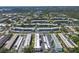 An aerial view of the condo community with lush surroundings and convenient parking at 5971 Terrace Park N Dr # 307, St Petersburg, FL 33709