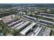 Aerial view of the community showcases the layout, landscaping, and amenities, nestled near the serene waterfront at 5971 Terrace Park N Dr # 307, St Petersburg, FL 33709