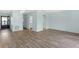 Spacious living room with light blue walls and light wood flooring at 5971 Terrace Park N Dr # 307, St Petersburg, FL 33709