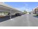 Assigned covered parking in a well-maintained lot, providing shade and convenience for residents and their vehicles at 5971 Terrace Park N Dr # 307, St Petersburg, FL 33709