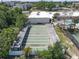 Aerial view showcases the community shuffleboard courts surrounded by landscaping at 5971 Terrace Park N Dr # 307, St Petersburg, FL 33709