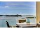 Balcony overlooking the waterfront features seating and a beautiful view at 755 Collany Rd # 504, Tierra Verde, FL 33715