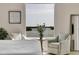Beautiful bedroom with water views, sitting area, and lots of natural light at 755 Collany Rd # 504, Tierra Verde, FL 33715
