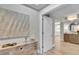 Elegant entryway with wood floors, stylish console table, and modern decor at 755 Collany Rd # 504, Tierra Verde, FL 33715