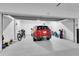 Spacious two car garage with ample storage and organization space at 755 Collany Rd # 504, Tierra Verde, FL 33715