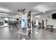 Well-equipped gym with modern fitness machines and floor to ceiling mirrors at 755 Collany Rd # 504, Tierra Verde, FL 33715