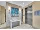Elegant lobby with decorative wall art, modern lighting, and convenient elevator access at 755 Collany Rd # 504, Tierra Verde, FL 33715