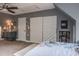 Bedroom featuring a bed with a floral design and closet with a barn door at 758 Claudia Ln, Palm Harbor, FL 34683