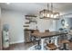 Charming dining space featuring a unique table and bar area, perfect for entertaining guests at 758 Claudia Ln, Palm Harbor, FL 34683