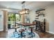 Bright dining area with a stylish table and chairs, ideal for Gathering meals and gatherings at 758 Claudia Ln, Palm Harbor, FL 34683