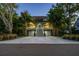 Stunning two-story home with meticulously maintained landscaping, dual driveways and curb appeal at 758 Claudia Ln, Palm Harbor, FL 34683