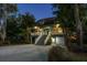 Beautiful two-story home with a welcoming staircase, lovely landscaping, and a two-car garage at 758 Claudia Ln, Palm Harbor, FL 34683