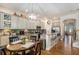 Bright kitchen with a dining area and kitchen island with barstool seating at 7606 S Sparkman St, Tampa, FL 33616