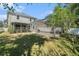 Backyard view of a screened-in pool and porch at 7606 S Sparkman St, Tampa, FL 33616