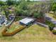 Aerial view of the property showing the fenced backyard, landscaping, and overall layout at 901 King St, Plant City, FL 33563