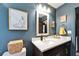 Bathroom with stylish fixtures, vanity, and decor at 901 King St, Plant City, FL 33563