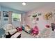 bedroom with a light pink and blue color scheme and themed décor at 901 King St, Plant City, FL 33563