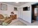 Well-decorated bedroom with closet, flat screen tv, and wood-look flooring at 901 King St, Plant City, FL 33563
