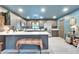 Modern kitchen with a spacious island, stainless steel appliances, and sleek cabinetry, perfect for culinary enthusiasts at 901 King St, Plant City, FL 33563