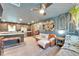 Inviting living room featuring modern decor, an open flow to the kitchen, and stylish seating arrangements at 901 King St, Plant City, FL 33563