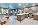 Open-concept living space merging a cozy seating area with a modern kitchen, ideal for entertaining and Gathering living at 901 King St, Plant City, FL 33563