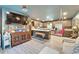 Stylish living room with contemporary decor, a large television, and seamless access to the modern kitchen at 901 King St, Plant City, FL 33563