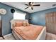 Spacious main bedroom with neutral walls and a ceiling fan at 901 King St, Plant City, FL 33563
